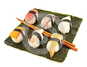 Nigirizushi sushi over nori sheet