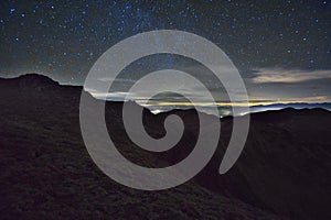 Nigt view with stars from Skalka mountain with clouds during autumn in Low Tatras mountains