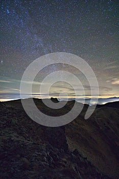 Nigt view with stars from Skalka mountain with clouds during autumn in Low Tatras mountains