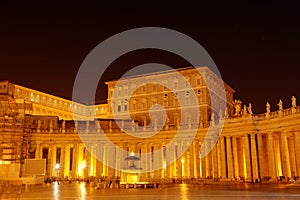 Nigth view of Colonnade of Saint Peters Basilica.
