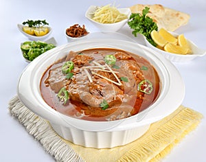 Nihari or Nehari is a tender meat stew. Cooked in various spices on low heat.