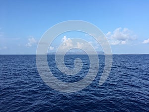 Niihau Island Seen on Horizon in Pacific Ocean in Hawaii.