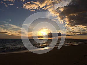 Niihau Island Seen on Ocean Horizon during Sunset - View from Kekaha on Kauai Island, HI.