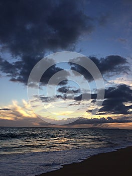 Niihau Island Seen on Ocean Horizon during Sunset - View from Kekaha on Kauai Island, HI.