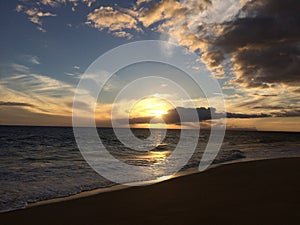 Niihau Island Seen on Ocean Horizon during Sunset - View from Kekaha on Kauai Island, HI.