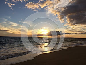 Niihau Island Seen on Ocean Horizon during Sunset - View from Kekaha on Kauai Island, HI.