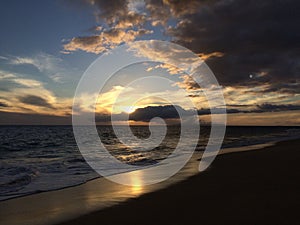 Niihau Island Seen on Ocean Horizon during Sunset - View from Kekaha on Kauai Island, HI.