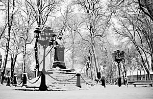 Nikolai Gogol Old Monument in Nizhyn, Ukraine, coverd snow. .