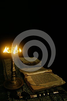 Nilavilakku lights glowing and ancient books