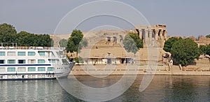 Nile Cruise Boat Next to Temple in Egypt