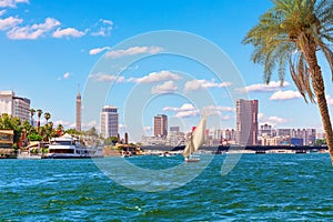 Nile view, modern bridge and center Cairo buildings, Egypt