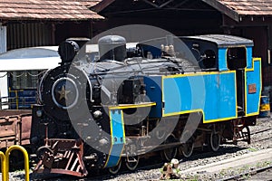 Nilgiri mountain railway. Blue train. Unesco heritage. Narrow-gauge. Steam locomotive in depot