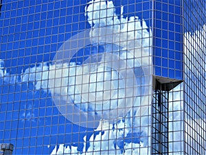 Nimbus clouds reflected in town office building, Tampa