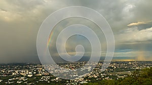 Nimbus and rainbows over the city