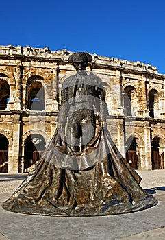 Nimes bullring and statue