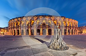 Nimes, France. Roman amphitheater at dusk photo