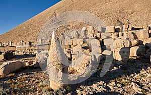 Nimrod mountain local name is nemrut dagi, during sunset, shadow of ancient commegene king.