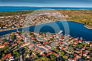 Nin, Croatia - Aerial panoramic view of the historic town and small island of Nin with blue Adriatic sea on a sunny summer morning