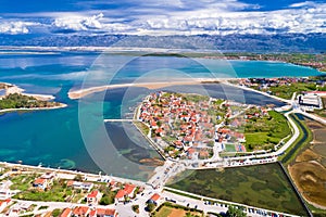 Nin. Historic town of Nin laguna aerial view with Velebit mountain background