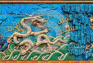 Nine Dragon Wall of marble carving of dragons playing with pearl