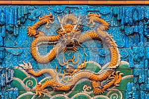 Nine Dragon Wall of marble carving of dragons playing with pearl