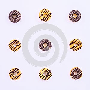 Nine Glased Donuts on the white background.