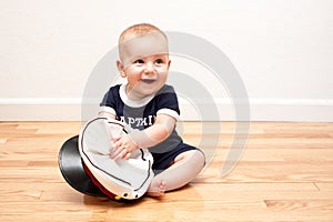 Nine month old baby in navy blue and white