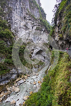 The Nine Turns Trail in Taiwan is a mesmerizing symphony of nature, where lush forests, cascading waterfalls, and towering cliffs