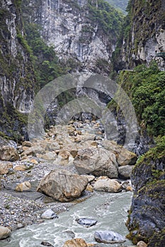 The Nine Turns Trail in Taiwan is a mesmerizing symphony of nature, where lush forests, cascading waterfalls, and towering cliffs