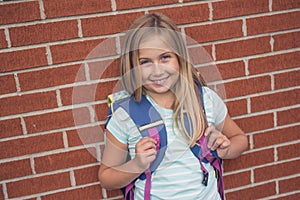 Nine years old girl student at school