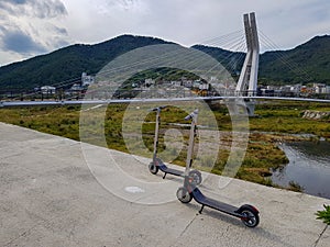 Ninebot by Segway ES2 Kickscooter park near the suspension bridge in Gohyeon-dong