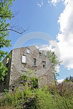 Nineteenth century factory returning to nature