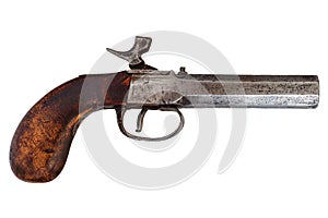 Nineteenth century handgun isolated on white