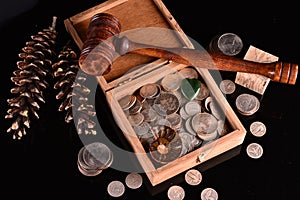 Ninety Percent Silver Coins in Box with Gavel and Pine Cones