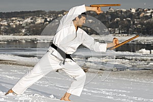 Ninja with tonfa in snow