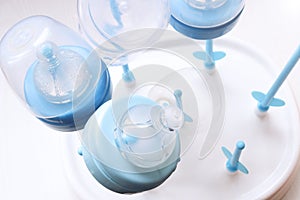 Nipples for baby feeding jars. Baby nipples dry after washing on a special support.