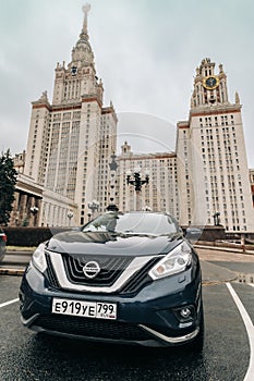 Nissan Murano car, front side view. Dark blue crossover parked on parking lot in front of Lomonosov Moscow State University
