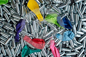 Nitrous oxide canisters / cream puff chargers and balloons: steel cylinders contain nitrous oxide / laughing gas for legal high