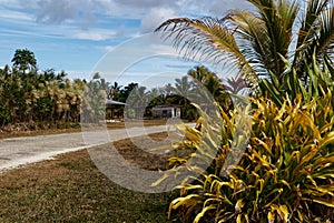 A Niue village with the main, circular road running through