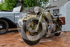 Green military motorcycle at Classic Soviet Car Exhibition