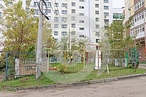 Nizhny Novgorod, Russia. - October 13.2016. Children& x27;s playground is fenced with a fence with a locked gate.