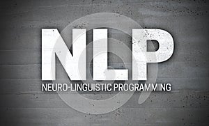 NLP on concrete wall background photo