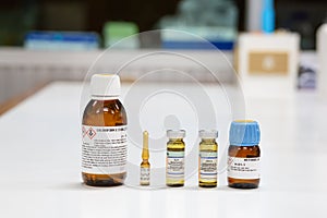 NMR Solvent glass bottles, chloroform, pyridine, D2O, DMSO, and methanol