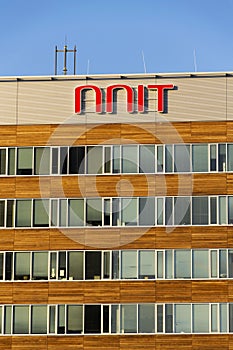 NNIT international IT service provider company logo on Czech headquarters building