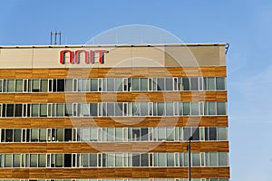 NNIT international IT service provider company logo on Czech headquarters building