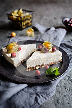 No bake yoghurt and coconut cake with almond, dried plums and chia seeds crust