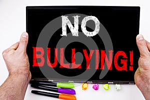 No Bullying text written on tablet, computer in the office with marker, pen, stationery. Business concept for Bullies Prevention A