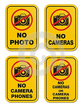 No cameras or camera phones signs