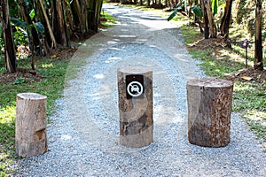 No car entry sign on the log, the passage of vehicles prohibited
