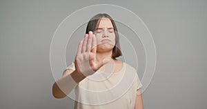 No. Courageous latin teenager girl extend hand in stop gesture oppose against domestic sexual violence abuse racial